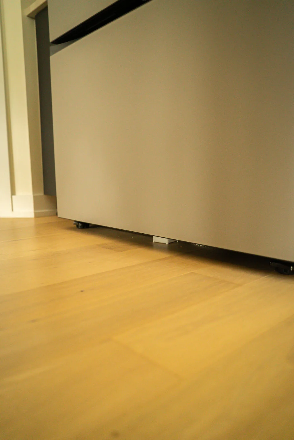 Astra Sensor positioned beneath a refrigerator