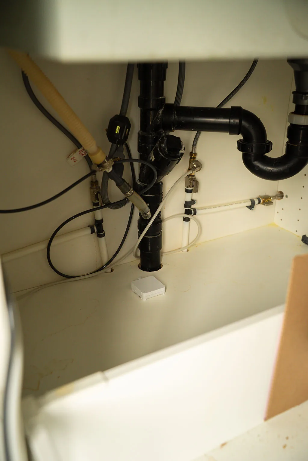 Astra Sensor positioned beneath sink plumbing